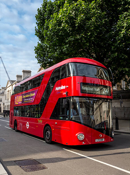 Modern London Bus London, UK - July 5, 2013: One of the new London Buses on a road en route to Hampstead Heath. These modern looking buses which currently run from Hampstead to Pimlico, are billed as the greenest and cleanest in the world and have been in operation since 2012. The bus is sometimes referred to as the 'Boris Bus' due to it being introduced whilst Boris Johnson was Mayor of London. boris bus stock pictures, royalty-free photos & images