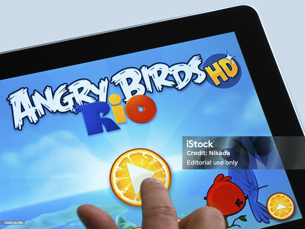 iPad-Spiel - Lizenzfrei Angry Birds - Videospiel-Name Stock-Foto