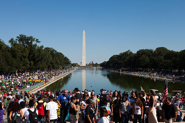 Washington DC, USA, October 2,2010. A shot of the crowd at the One Nation Rally, a march for union and civil rights. The Reflecting Pool, Washington and the Capitol building can be seen in the distance.