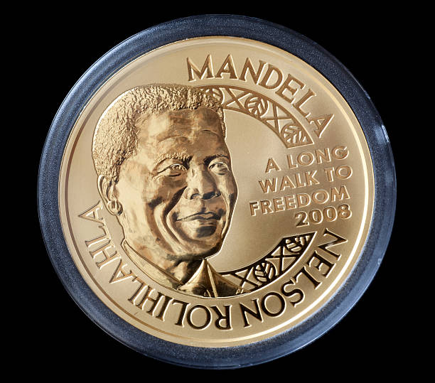 Nelson Mandela gold coin stock photo