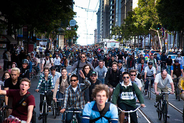 San Francisco, California - June 26, 2009: Critical Mass is a bicycling event typically held on the last Friday of every month in over 300 cities around the world. The ride was originally founded in 1992 in San Francisco. The purpose of Critical Mass is not usually formalized beyond the direct action of meeting at a set location and time and traveling as a group through city or town streets on bikes, attempting to halt all normal city traffic.