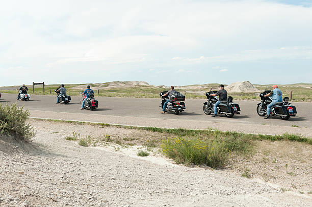 Ottawa, Canada - July 1, 2021: A row of motorcycles in front of Parliament Hill during the Cancel Canada Day rally. They believe it is not proper to celebrate Canada Day in light of the recent discovery of unmarked graves on residential school grounds.