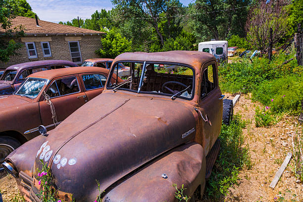 Orderville, USA - July 15, 2008: junk yard with old beautiful oldtimers on the route 89 on July 15, 2008 in Orderville, USA. America is a spot for european classic car hunters.