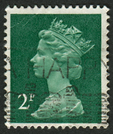 Gomel, Belarus - April 5, 2013: Postage stamp. A stamp printed in UK shows image of Elizabeth II is the constitutional monarch of 16 sovereign states known as the Commonwealth realms, in green, circa 1971.