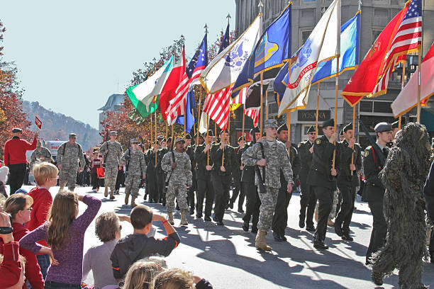 愛国心パレード - child military saluting flag ストックフォトと画像