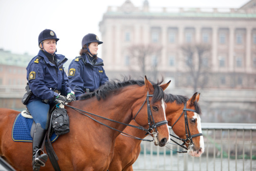 Italian Municipal Police with their patrols and cars direct traffic in the city, intervene in traffic accidents, and issue fines and penalties to motorists who do not obey traffic laws.