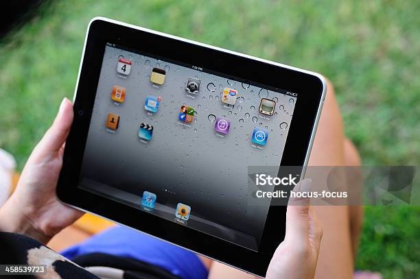 Using Ipad In Park Stock Photo - Download Image Now - Adult, Agricultural Field, Big Tech