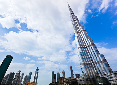 Dubai, UAE - January 14, 2012: view of the Burj Khalifa tower compared with the others skyscraper of the city of Dubai.