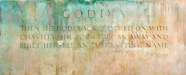 Lady Godiva Statue sign Coventry Coventry, England April 2, 2011: This is the carved sign beneath the Lady Godiva bronze statue in Coventry city centre, it is a quote from Tennyson. coventry godiva stock pictures, royalty-free photos & images