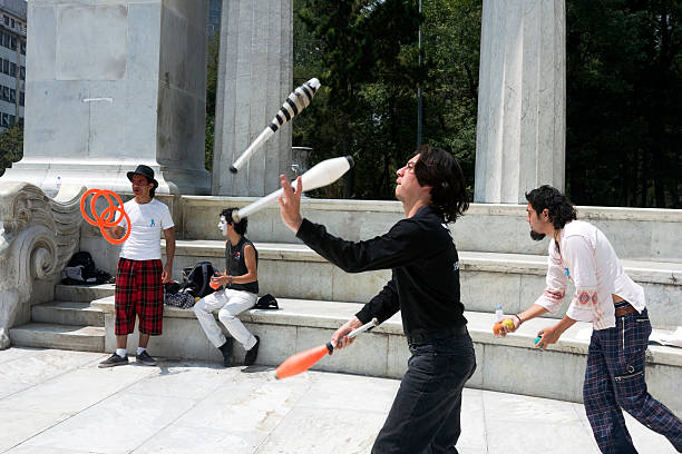 Mexico City, Mexico - September 29, 2008: A group of young street performes in mexico city at the Juarez Memorial Monument in the city downton. In this case they gathered to celebrate the 2008 Mexico\\'s deaf people day, celebrated each year at the same place.