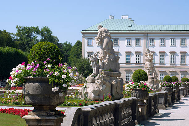 Sculptures at Mirabell Gardens in Salzburg, Austria Salzburg, Austria - August 6, 2013: Sculptures at Mirabell Gardens next to Mirabell Palace are seen during the daytime. The sculptures date from 1690 and were created by Italian sculptor Ottavio Mosto (1659-1701). editorial architecture famous place local landmark stock pictures, royalty-free photos & images