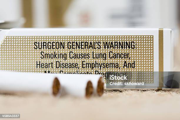 Warning On Pack Of Marlboro Cigarettes Stock Photo - Download Image Now - Danger, Cigarette, Tobacco Product