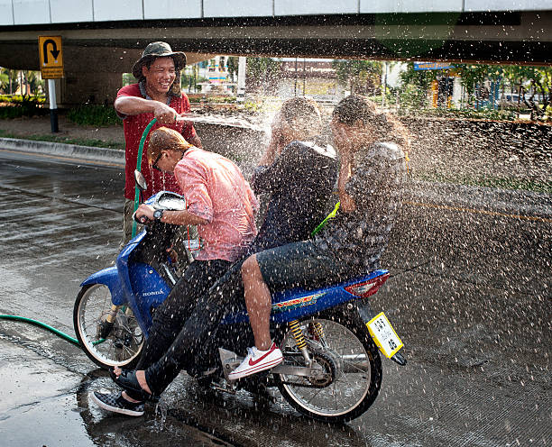 Songkran Hosing stock photo