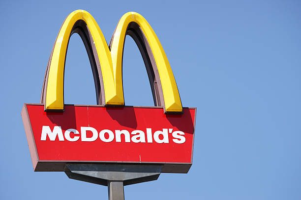 Closeup Mcdonalds Outdoor Sign Against Blue Sky Stock Photo - Download  Image Now - McDonald's, Restaurant, Drink - iStock