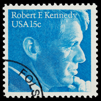 Sacramento, California, USA - March 19, 2011: A 1979 USA postage stamp with a portrait of Robert Francis Kennedy (1925-1968). Kennedy was the younger brother of the 35th US President John Kennedy, and like his brother was also killed by an assassin's bullet. This postage stamp was the first time that two brothers have appeared on separate US postage stamps.