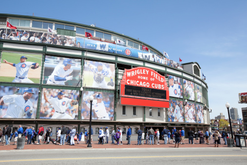 Chicago, USA- May 1,2011: Wrigley Field Stadium - Home of Chicago Cubs - major league baseball team of Chicago and people waiting in line in front of it. Wrigley Field is one of the oldest baseball fields in the country.