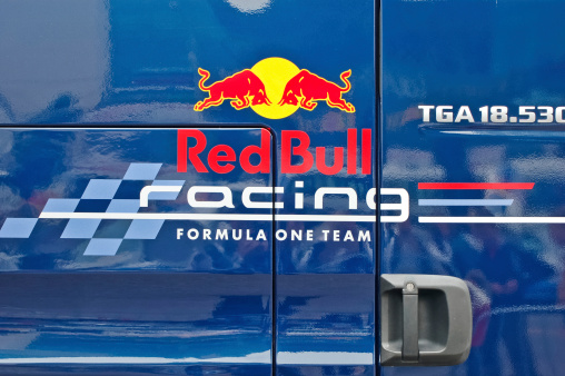 Vilnius, Lithuania - September 1, 2010: Red Bull Formula 1 racing team logo on service truck side. Truck is parked at the parking lot near the hotel Radisson Blu where press conference with David Coulthard was held before the main Red Bull Speed Avenue event.