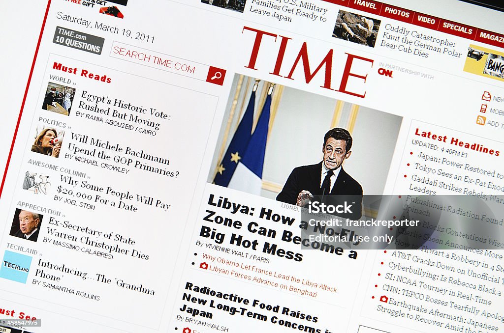 www.time.com main page Florence, Italy - March 19, 2011: Close up of the www.time.com web pages show news about the attack of France airforce against libian military soldiers. Time is a weekly information newspaper published in the United States of America since 1923.The browser is Internet Explorer 8. Cecilia Attias Stock Photo