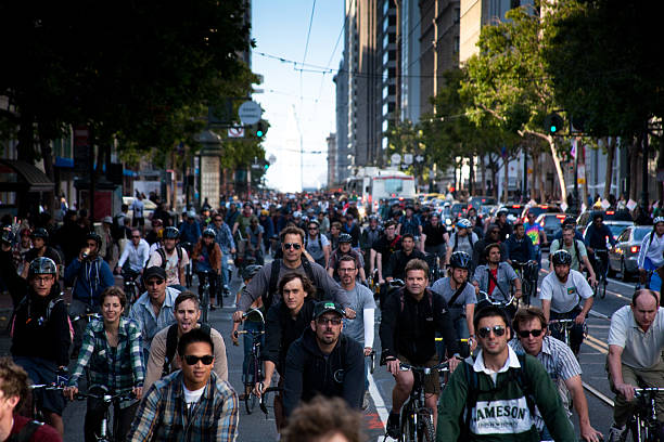 San Francisco, California - June 26, 2009: Critical Mass is a bicycling event typically held on the last Friday of every month in over 300 cities around the world. The ride was originally founded in 1992 in San Francisco. The purpose of Critical Mass is not usually formalized beyond the direct action of meeting at a set location and time and traveling as a group through city or town streets on bikes, attempting to halt all normal city traffic.