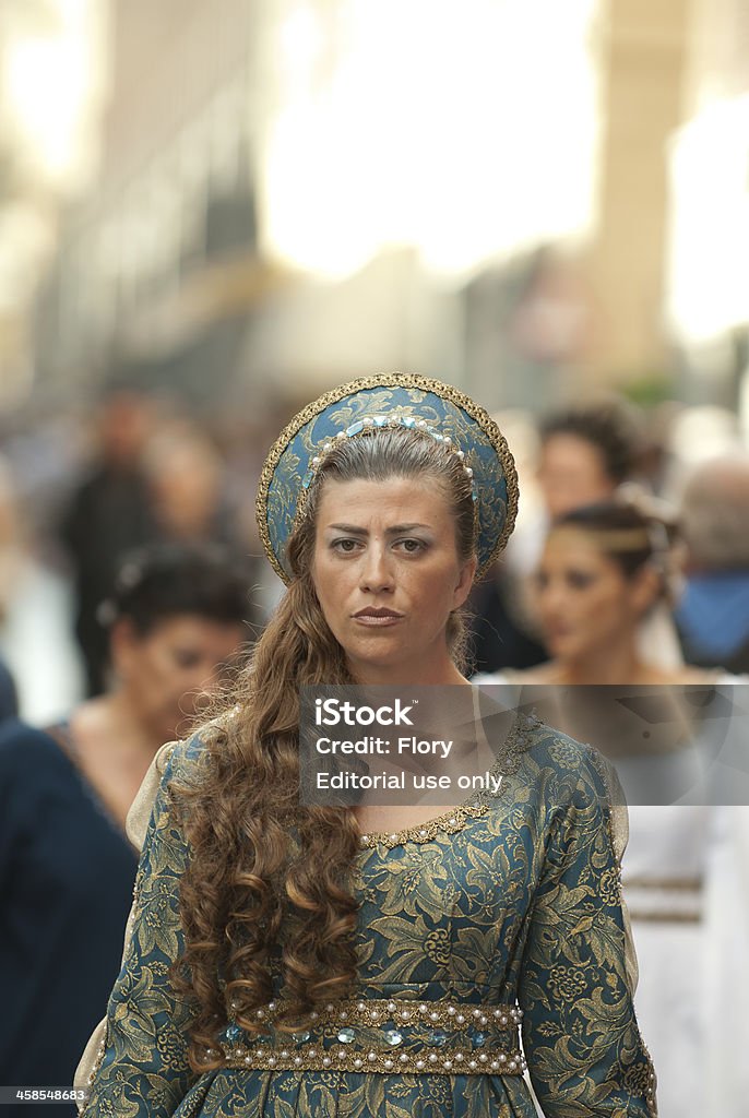 Young damadel Middle Ages Asti, Italy - September 19, 2010: Young Medieval Princess, during the historic parade of the Palio of Asti in Piedmont, Italy Adult Stock Photo