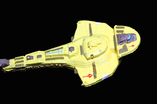 Graceful Against Space Vancouver, Canada - December 18, 2012: A Cardassian freighter from the Star Trek television show, on a black background. The model was made by Micro Machines, from Galoob. star trek characters stock pictures, royalty-free photos & images