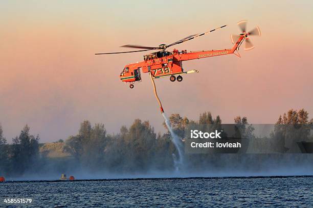 Air Crane Fighting Bush Fires Stock Photo - Download Image Now - Emergency Services Occupation, Fire - Natural Phenomenon, Firefighter