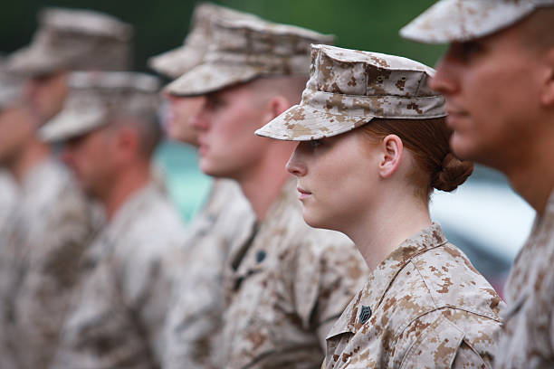 Red Haired Woman Marine in Formation Quantico, Virginia, United States - August, 2 2010: Formation of Marines with select focus on the Woman Marine. us marine corps stock pictures, royalty-free photos & images