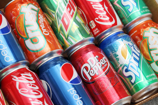 West Palm Beach, USA - March 29, 2011: Cross section view of multiple brands of soda in aluminum cans. Brands included in this group are Coca Cola, Pepsi, Dr. Pepper, Sprite, Mountain Dew, and Orange Crush.