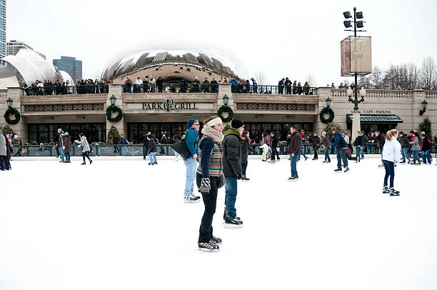 Millennium Park Ice Skating Chicago, Illinois, USA – December 17th 2011: People Ice Skating at Chicago’s Millennium Park located on Michigan Ave and Washington Street. millennium park stock pictures, royalty-free photos & images