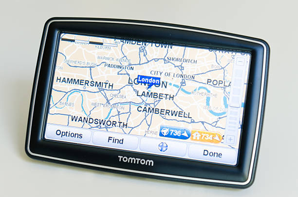 XXL TomTom showing map of London Florence, Italy - March 18, 2011: XXL TomTom on the table showing the roads map of London . TomTom International BV is a Dutch company that makes satellite navigation systems for automobiles, motorcycles, handhelds and smartphones. Each system has a processor and a touch screen. TomTom is the leading supplier of navigation systems in Europe with offices around the world. The model of TomTom is XXL Europe version with 5 inch screen. guidanc stock pictures, royalty-free photos & images