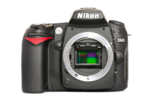 Leeds, UK - October 2, 2011: Nikon Digital SLR - D90 taken in a studio isolated on a white background