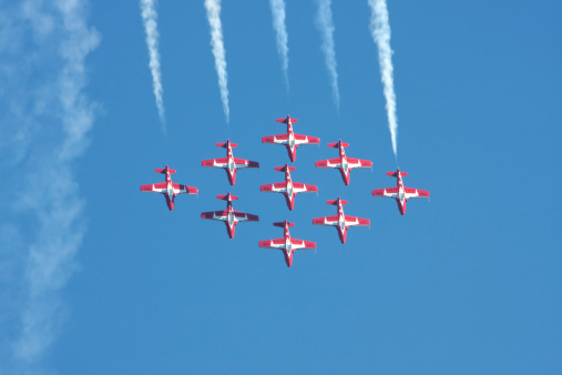 Abbotsford, Canada - August 14, 2010: The Canadian Forces  Snowbird demonstration team in formation in the air at the Abbotsford International Airshow.