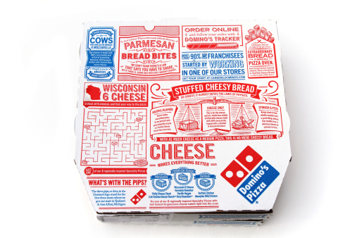West Palm Beach, USA - December 15, 2011: This is a studio shot of a box of Domino's Pizza. Domino's is one of the largest pizza delivery franchises in the USA.