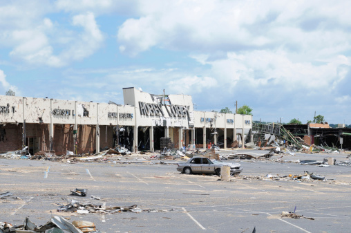 Tuscaloosa, Alabama, USA - July 17, 2011:  Hobby Lobby strip mall destroyed by tornado.  Image taken almost three months after the April 27, 2011 tornado that destroyed the store.  Copy space above.