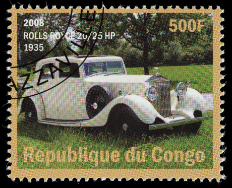 Sacramento, California, USA - February 8, 2009: A 2008 Republic of the Congo postage stamp with an image of an antique 1935 Rolls Royce 20/25 HP automobile. Nearly 4000 20/25 HP chassis were sold between World War I and II, making it Rolls Royce's best selling model during that period.