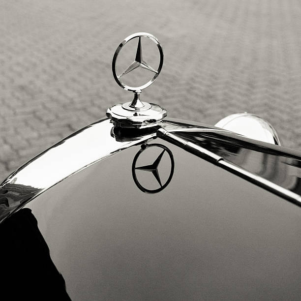 Emblem logo on a Mercedes-Benz 1935 200 Milan, Italy - May 11, 2011: Detail of the emblem logo on a Mercedes-Benz 1935 200 W21 mercedes benz photos stock pictures, royalty-free photos & images