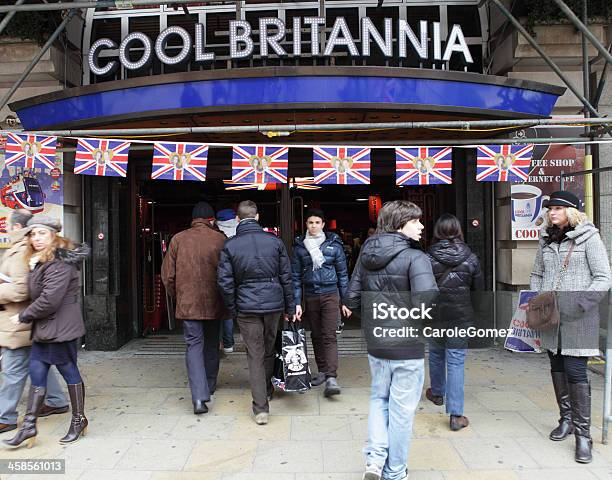 Tourists Outside London Store With Royal Wedding Flags Stock Photo - Download Image Now