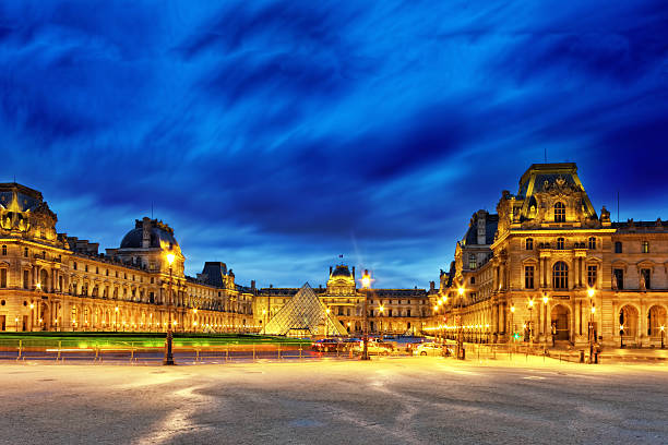 Paris, France - October 2025. A close-up of the facade of the Louvre Museum and a broken after the robbery of the century.