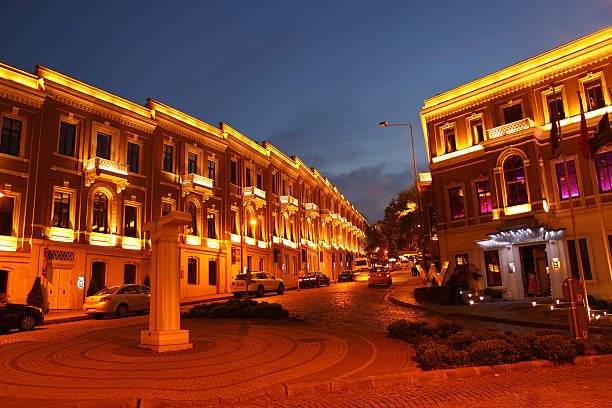 akaretler Istanbul, Turkey - June 15, 2011: Akaretler street features upscala garment boutiques,restaurants and side walk cafes housed in besiktas district of istanbul.The street was renovated late ottoman era row houses. row houses in istanbul stock pictures, royalty-free photos & images
