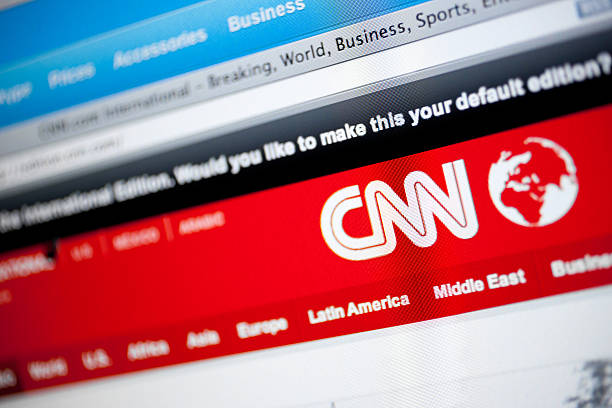 cnn-logo und eine webseite - cnn stock-fotos und bilder