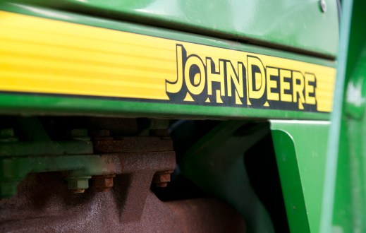 Katy Trail State Park, Missouri, United States - August 6, 2011: A John Deere tractor is used to maintain the trail in Missouri's Katy Trail State Park.  John Deere is a world leader in the manufacture of agricultural equipment.