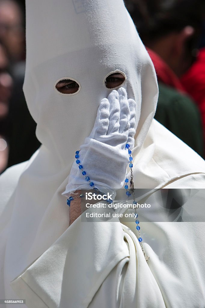 Penitent mit einem Rosenkranz in seiner hand - Lizenzfrei Kerze Stock-Foto