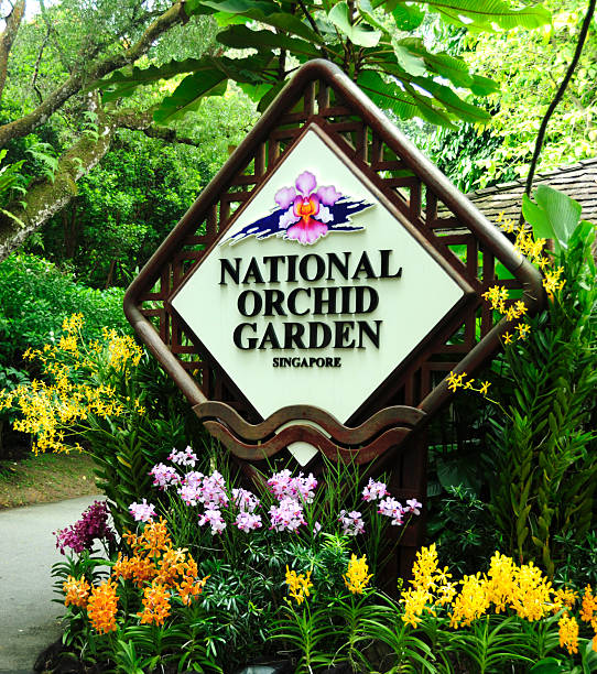 Singapore City, Singapore - March 16, 2011: National Orchid Garden. The image shows the sign at the entrance to the National Orchid Garden. These form part of Singapore's Botanic Gardens in the Tanglin area of the city. The orchid breeding program began in 1928 and over 600 species and hybrids of the plant are on display.