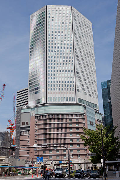Osaka, Japan - September 9, 2011 : Pedestrians walking at Umeda District. Hankyu Department Store is a famous department store chain in Japan. This flagship store is located in Kakuda-cho, Kita-ku, Umeda District, Osaka. This store is opened since September 2009.