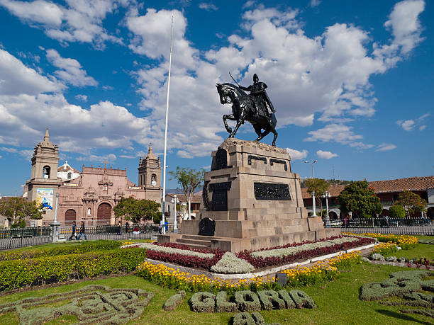 Ayacucho, Peru - August 20, 2009: City Square in Ayacucho, Peru. People can be seen walking in the distance.