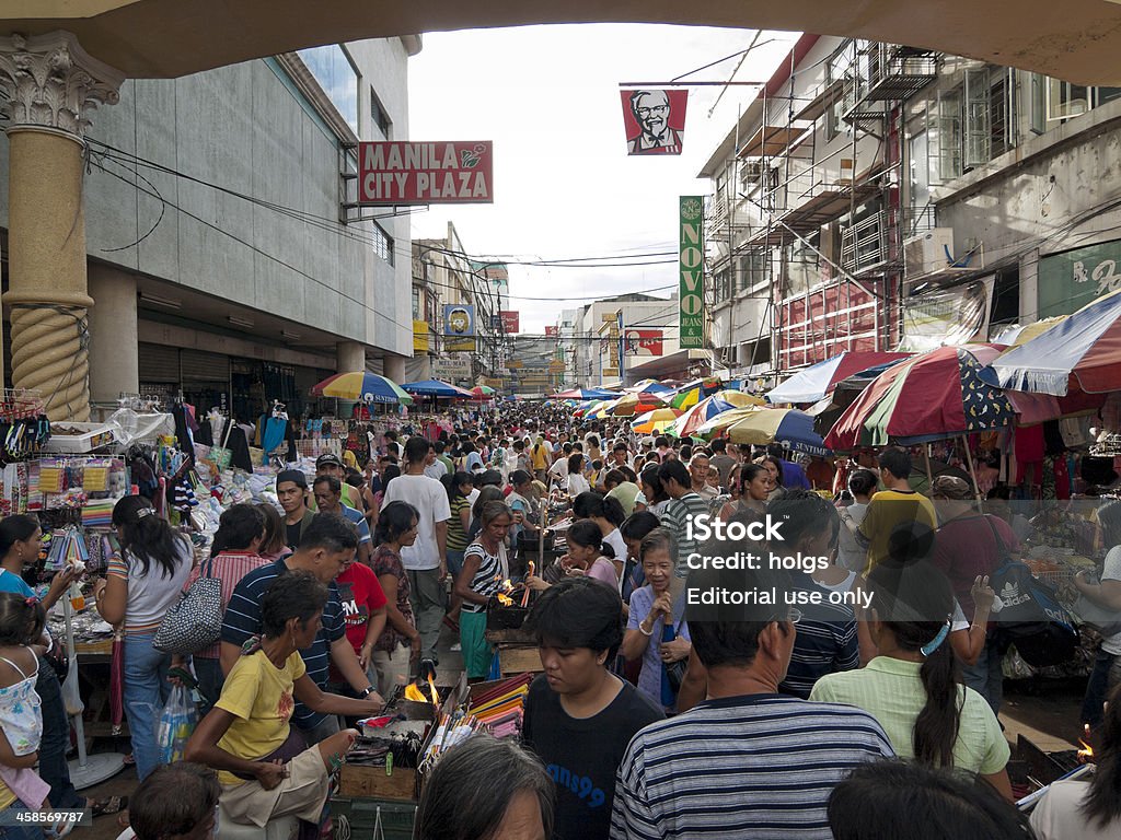 Affollato mercato in Manlia, Pesos - Foto stock royalty-free di Vendere