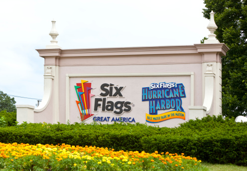 Gurnee, USA- June 25, 2011: An entrance sign to Six Flags Great America- an amazing outdoor theme park with roller coster rides and water park -Hurricane Harbor