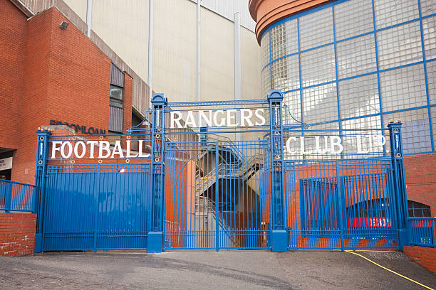 Ibrox Stadium, Glasgow Glasgow, UK - July 12, 2011: The Rangers Football Club Ltd. sign over the gates between the Main Stand and the Broomloan Road Stand at Ibrox Stadium, Glasgow, the home ground of Rangers Football Club. ibrox stock pictures, royalty-free photos & images