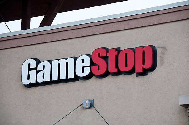 Game stop logo Denver USA - May 02, 2011: Gamestop   logo on one of their stores.  Gamestop sells new and used video and computer games brand name games console stock pictures, royalty-free photos & images