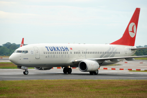 Manchester, England - July 5th, 2011: A Turkish Airlines Boeing 737 aircraft at Manchester International Airport EGCC. Turkish Airlines is the national flag carrier airline of Turkey.